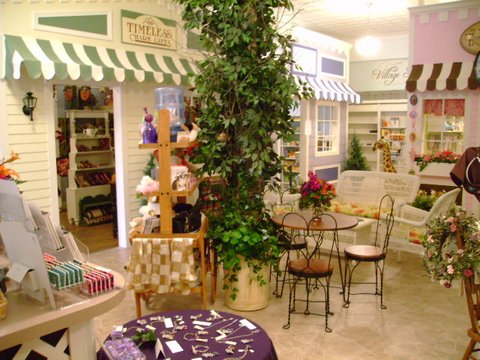 The Village column tree and a vendor cart - Washington Iowa - Photo by Cathy Lloyd